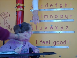 A child reading the Braille wall at Fairmount park